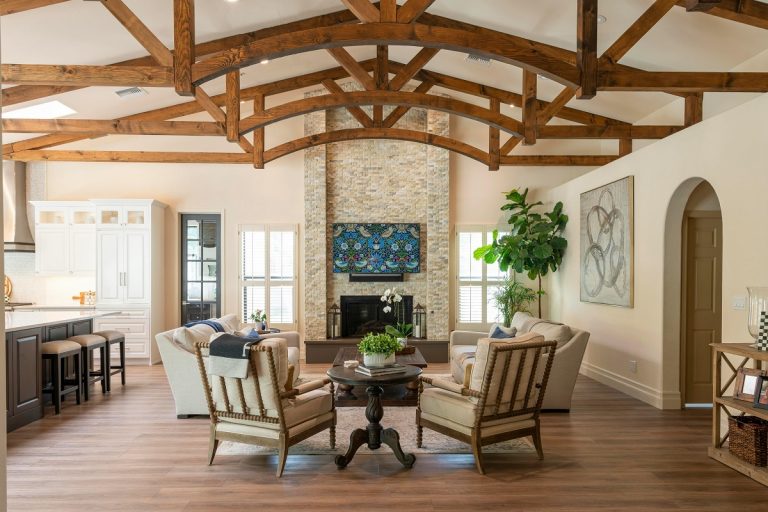 modern tudor house interior featuring exposed wooden beams and a cobblestone accent wall